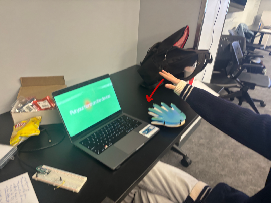Development setup: laptop running p5.js alongside the physical sculpture